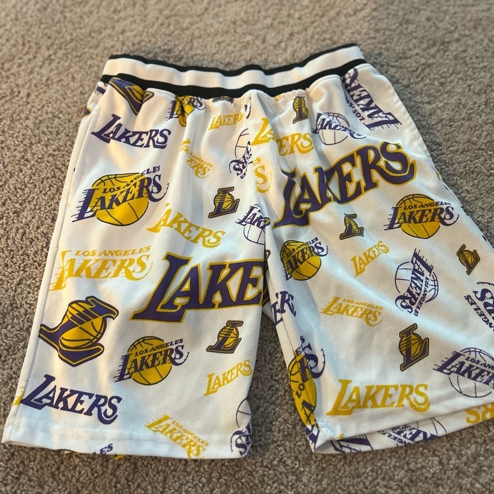 NBA Youth Large Lakers Basketball Short Black Purple & Gold

Size Youth Large